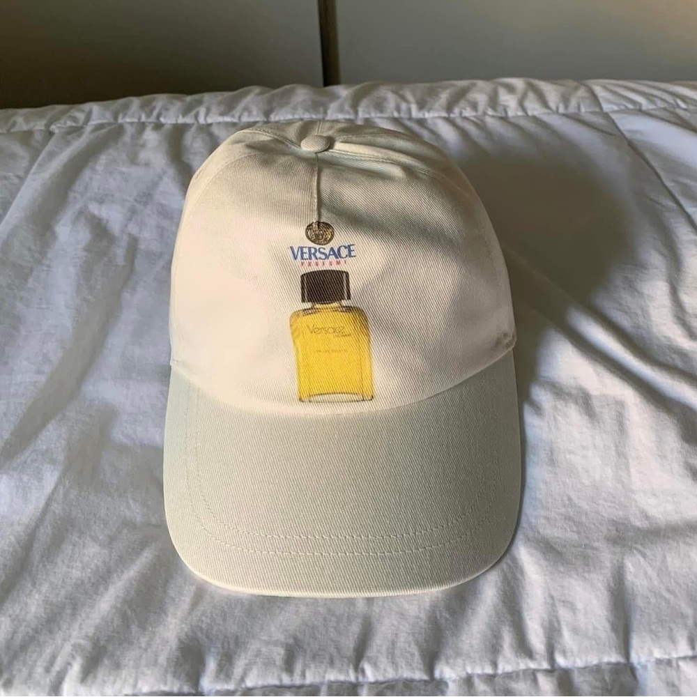 Versace Cream Cap with Yellow Bottle Design